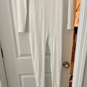 All white cat/body suit !